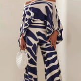 Dadizhimu Commuting Two Sets Of 2025 New One-Word Shoulder Clothing + High-Waisted Broad Leggings Printed Set
