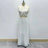 Dadizhimu Elegant Wind Two Sets 2025 New Chest Hanging Neck Loaf Side Top + High Waist Pressure Folded Skirt Dress